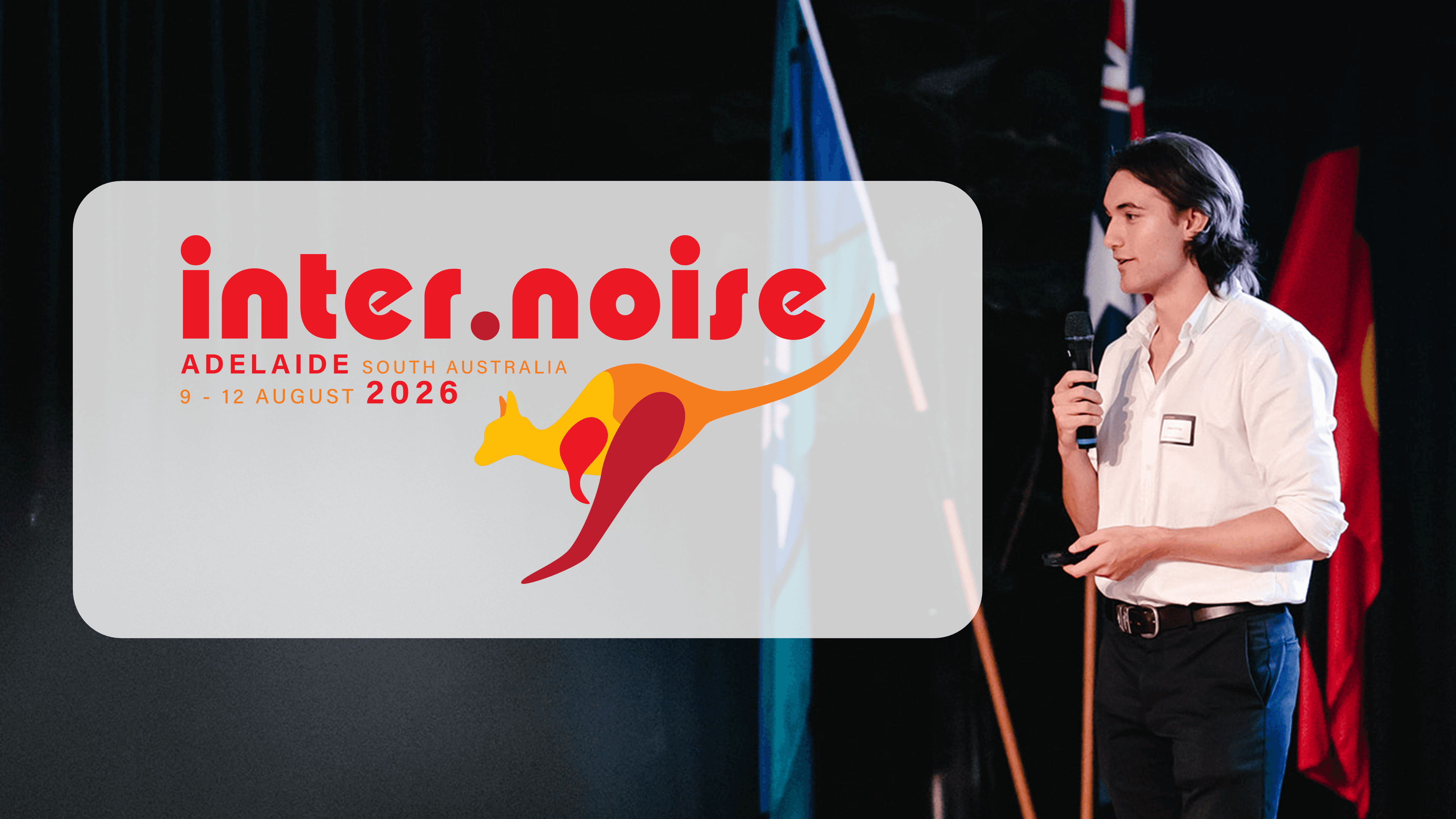 Joshua Winning presenting at INTER-NOISE 2026 in Adelaide beside the conference branding